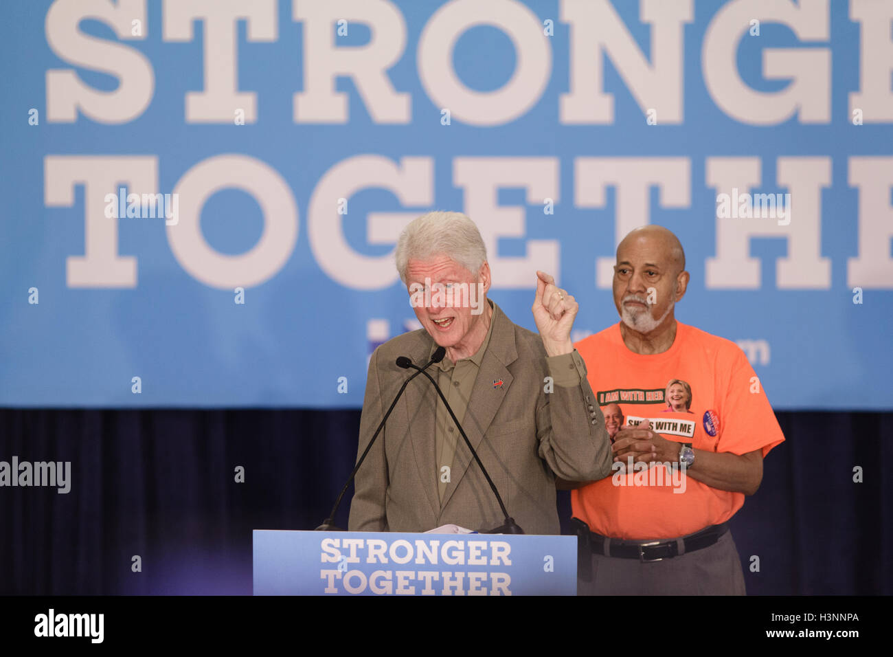 Belle Glade, USA. 11th Oct, 2016. Former President Bill Clinton speaking to Presidential Candidate Hillary Clinton supporters (with U.S. Rep Alcee Hastings by his side) at Palm Beach State College on October 11, 2016 in Belle Glade, FL. Credit:  The Photo Stock Photo