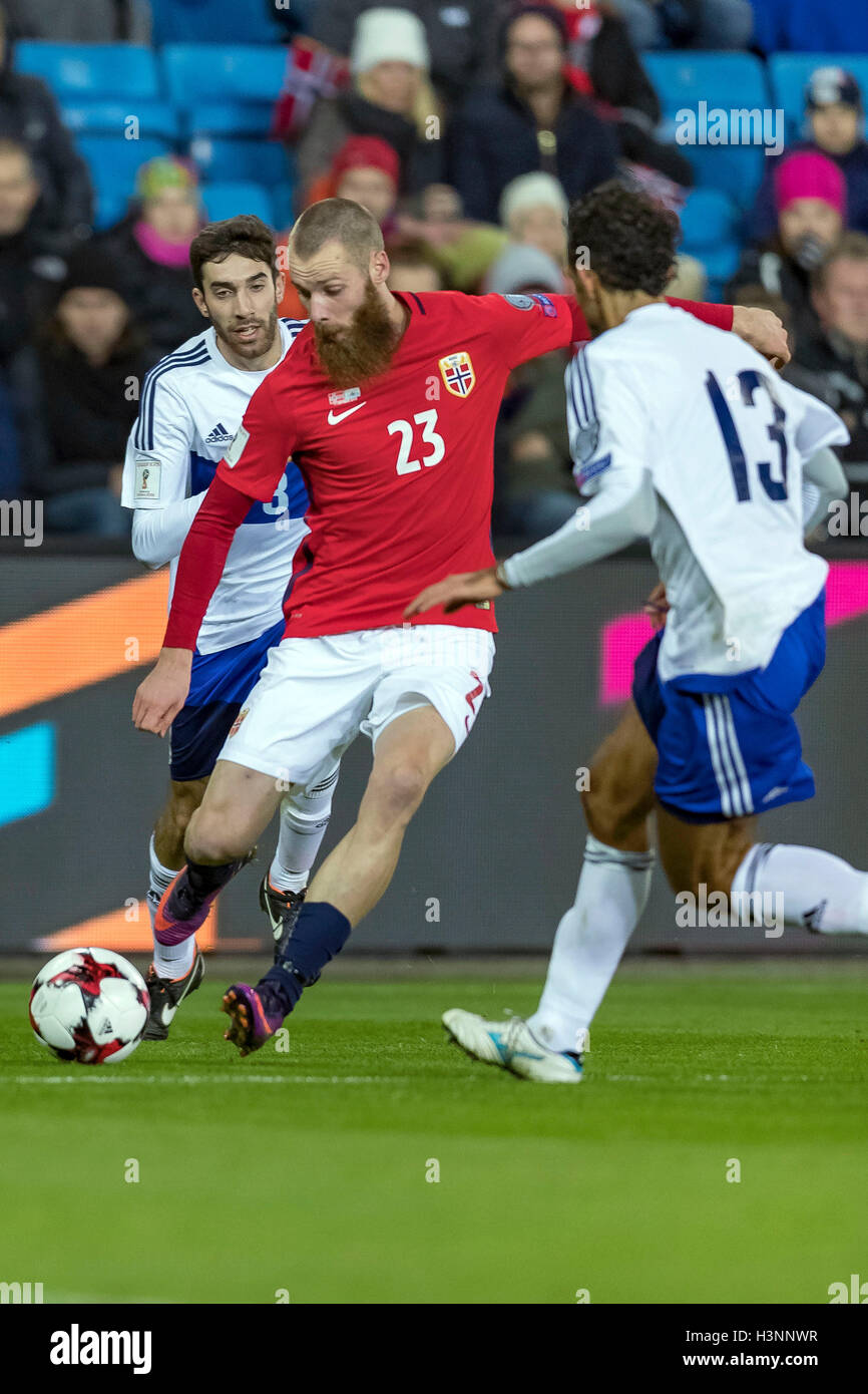 Ullevaal Stadion, Oslo, Norway. 11th Oct, 2016. FIFA World Cup Football Qualifying. Norway versus San Marino. Jo Inge Berget of Norway in action against Della Valle (sm) during the World Cup Football Qualifying match at the Ullevaal Stadion in Oslo, Norway. Credit:  Action Plus Sports/Alamy Live News Stock Photo