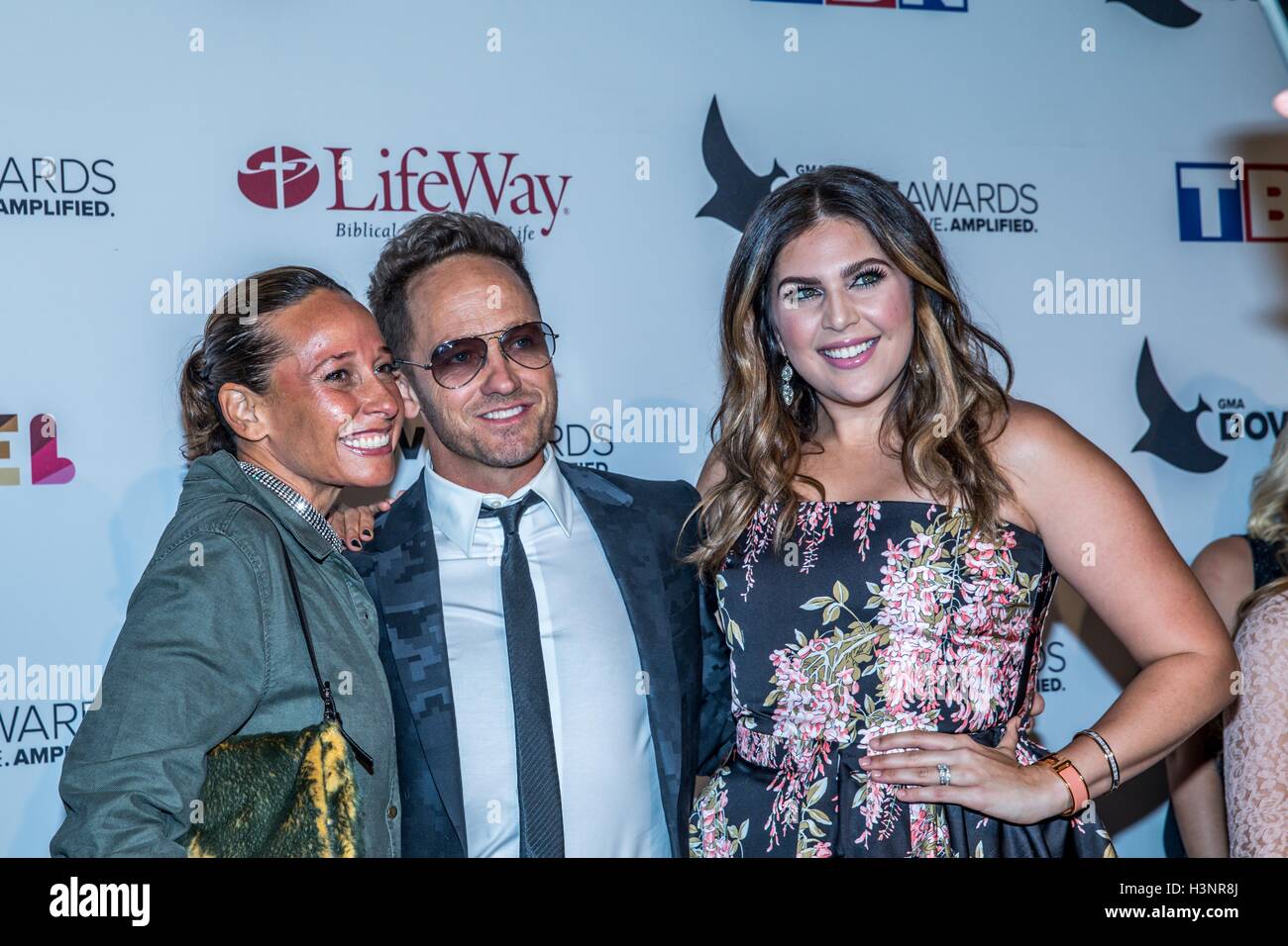 Nashville, Tennessee, USA. 11th Oct, 2016. TobyMac, Amanda Levy McKeehan and Scott at the 47th Annual GMA Dove Awards in Nashville, TN at Allen Arena on the campus of Lipscomb University.