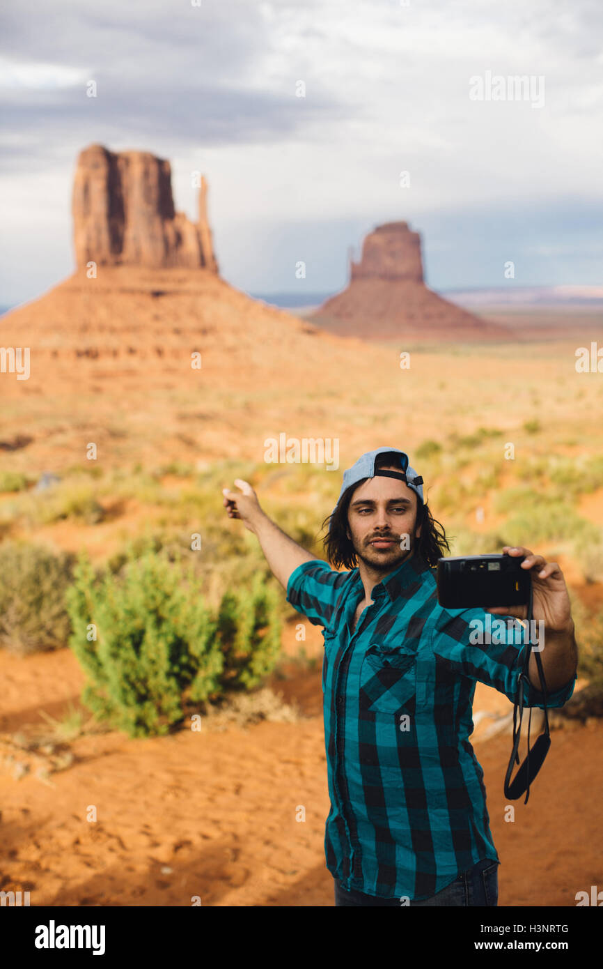 Young man pointing camera using hi-res stock photography and images - Alamy