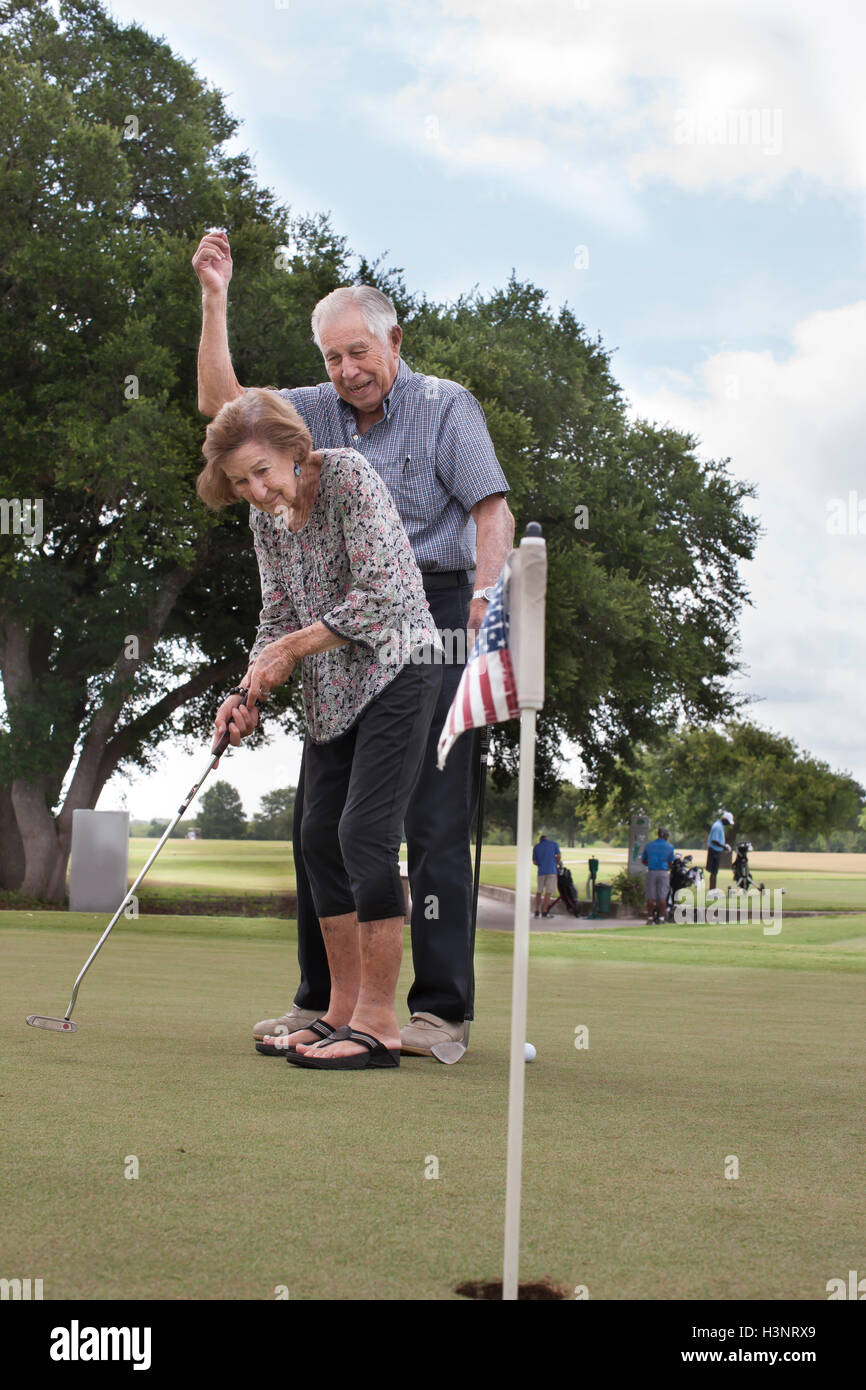 Senior couple playing golf Stock Photo Alamy