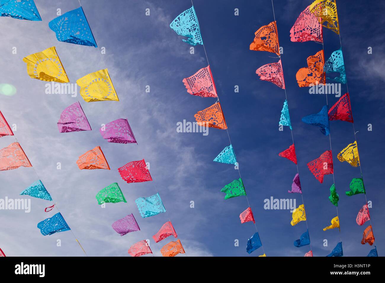 Rows of flags, low angle view, Oaxaca, Mexico Stock Photo