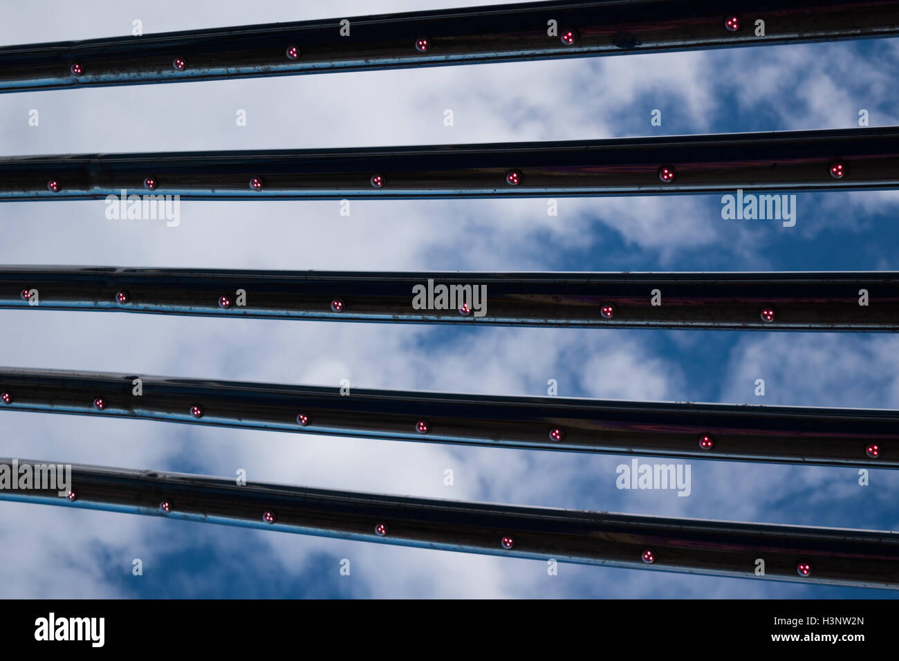 Abstract image of the sky and clouds reflected in the details of a building  on the seafront at Bridlington Stock Photo