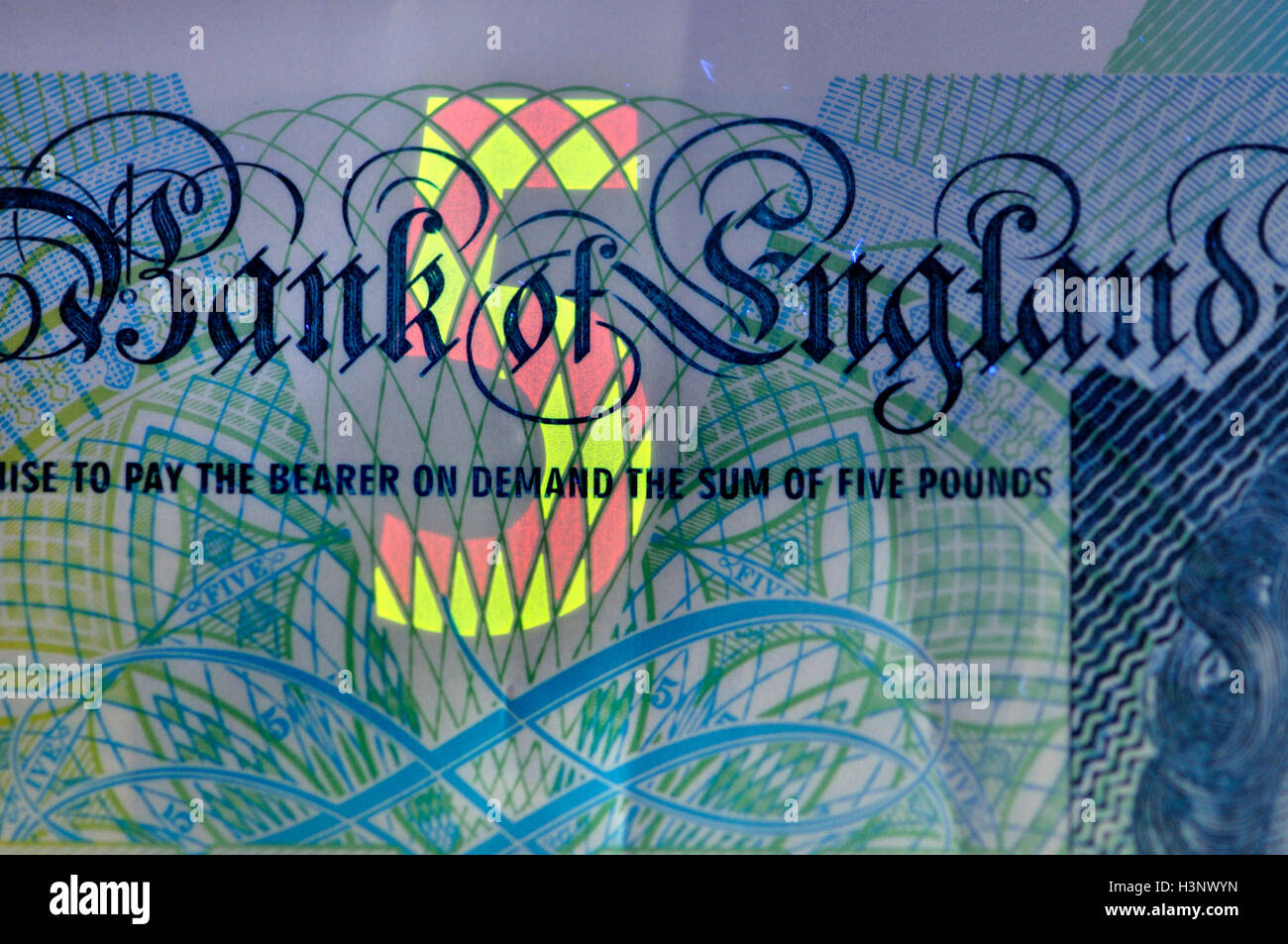 Banknote under ultraviolet light showing hires stock photography and