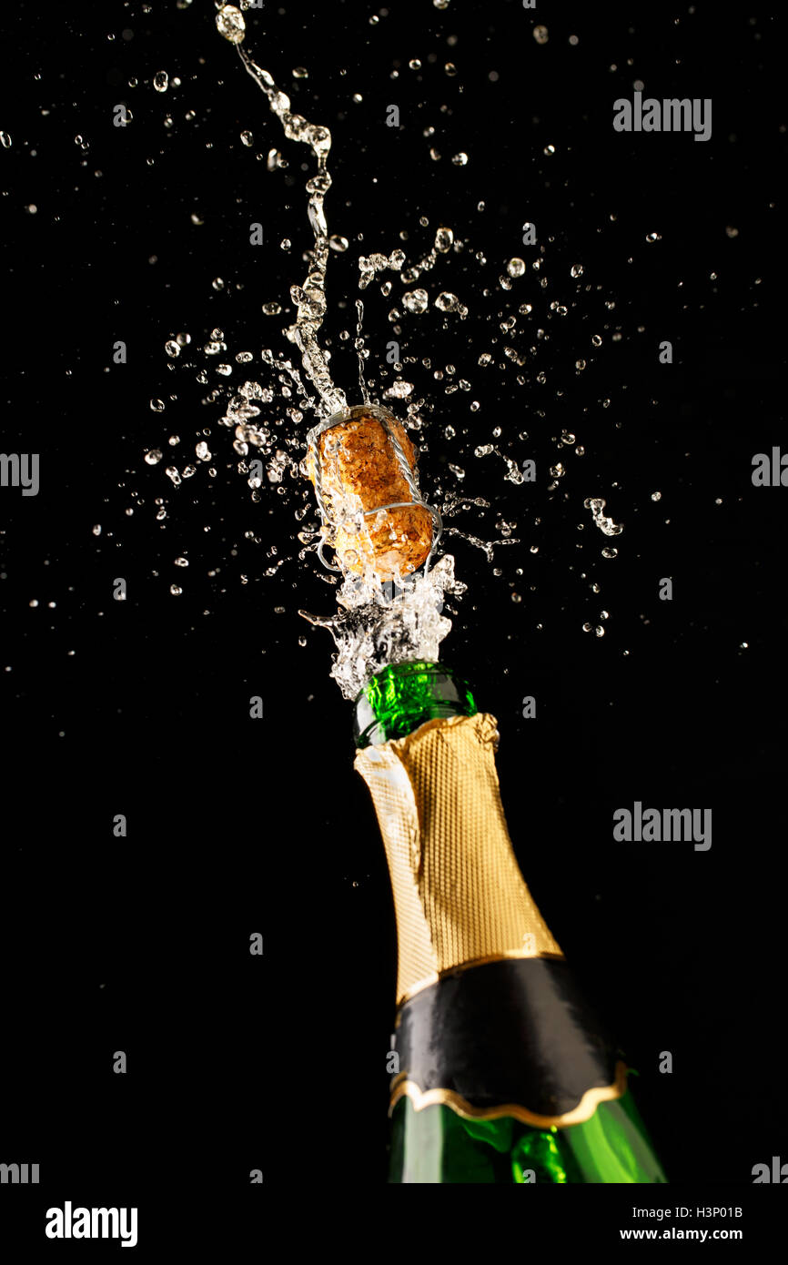 Download Green Champagne Bottle With Gold Foil And Cork Explosion Stock Photo Alamy PSD Mockup Templates