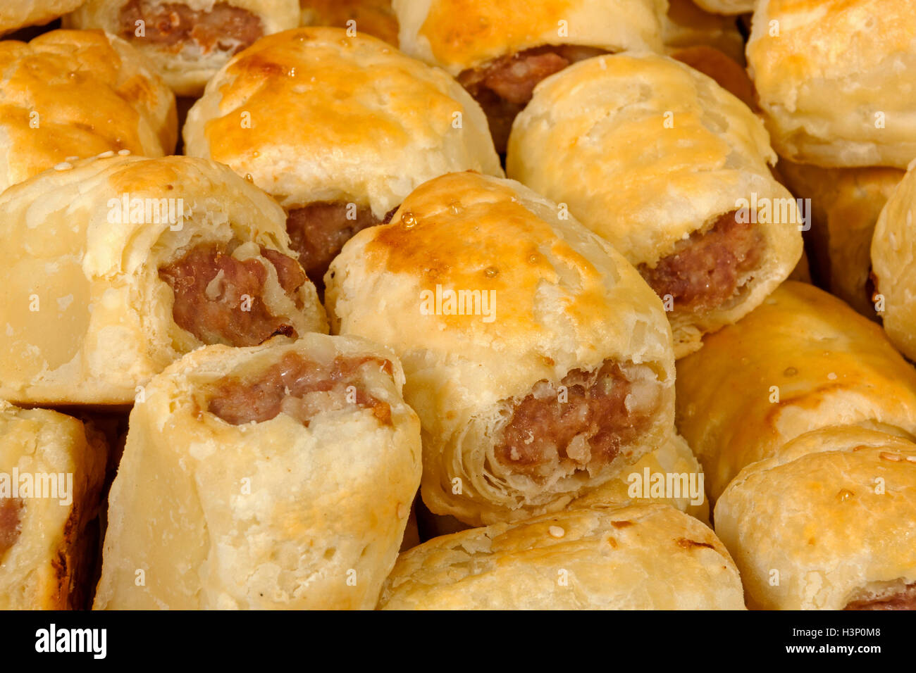 extreme close up freshly baked homemade cocktail sausage rolls Stock Photo