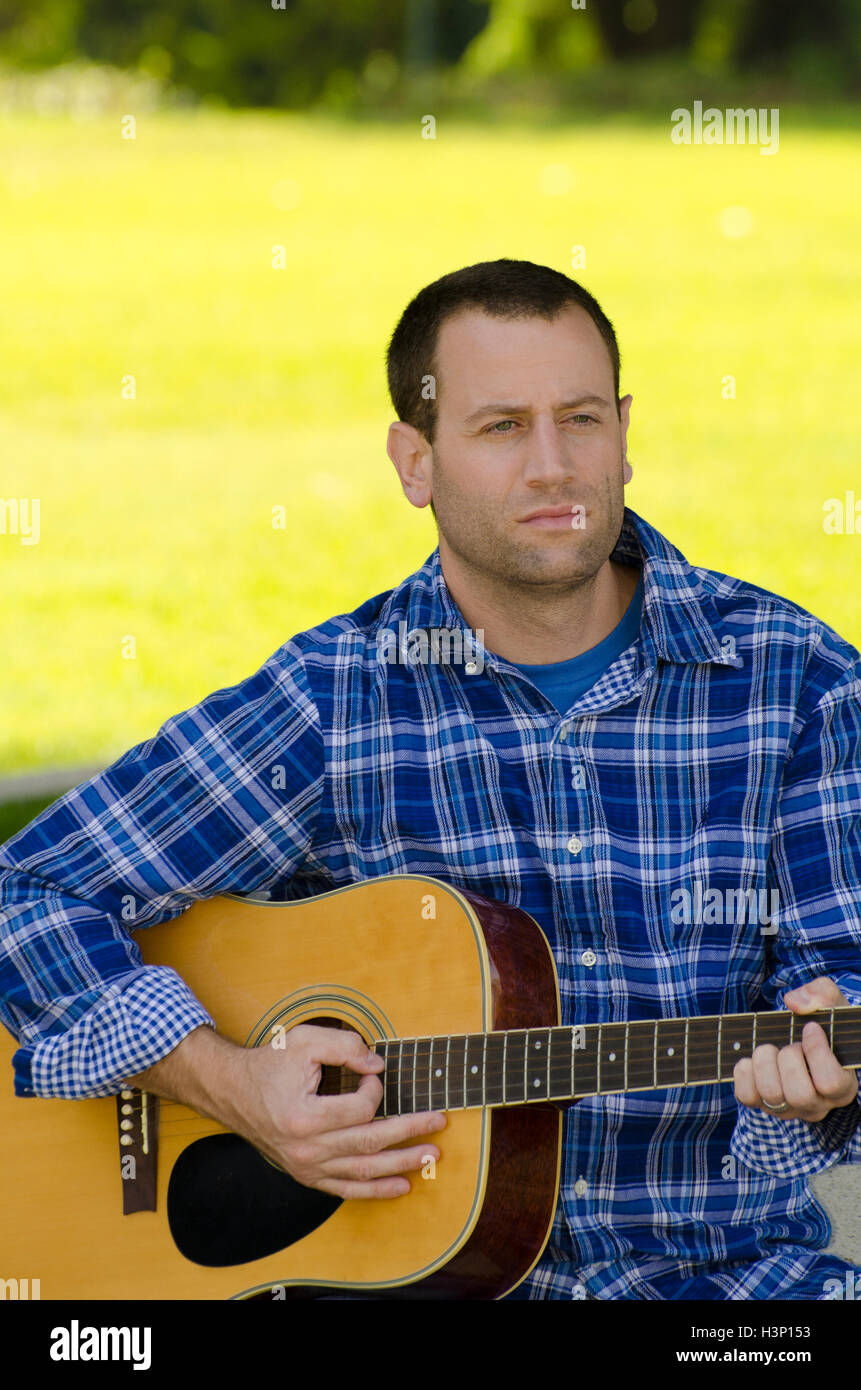 Creating music on a bright sunny day. Stock Photo