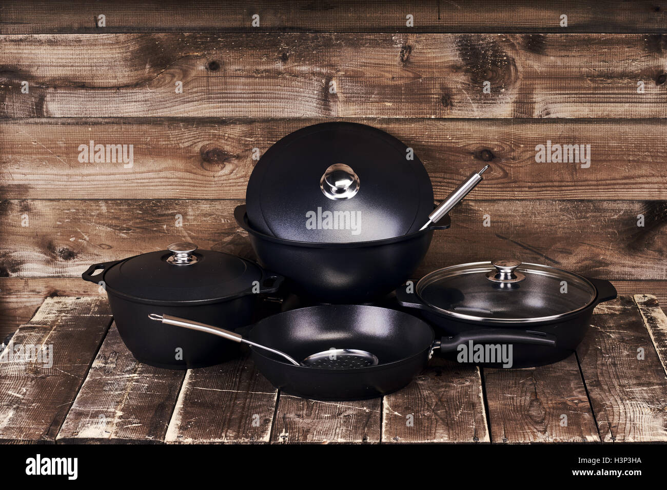 Collection of black pots Stock Photo Alamy