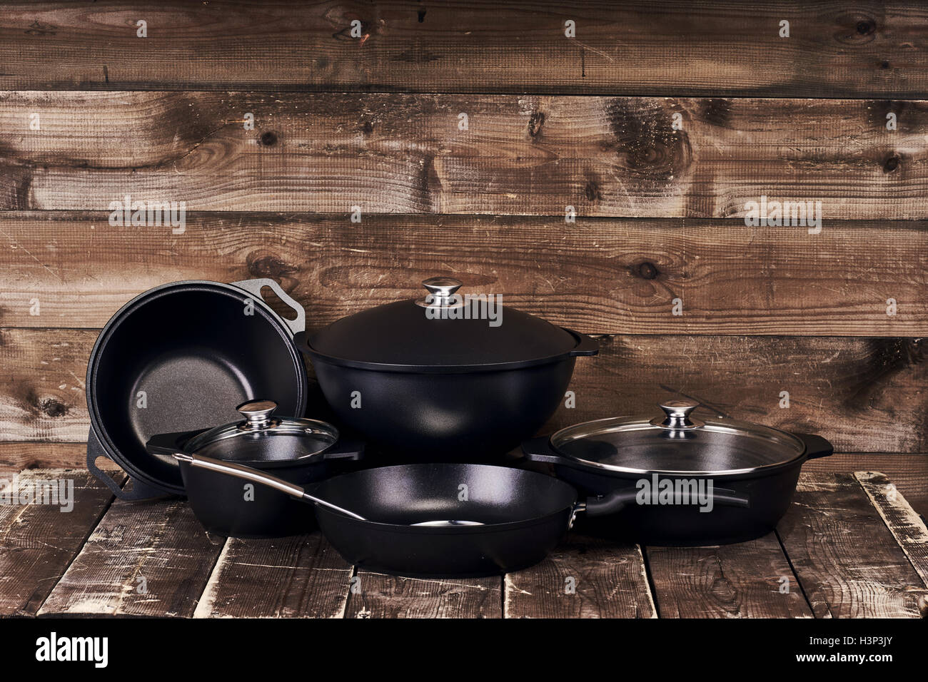 Collection of black pots Stock Photo Alamy