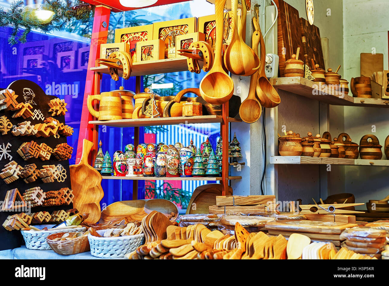 Traditional and festive kitchen accessories made of wood displayed for ...