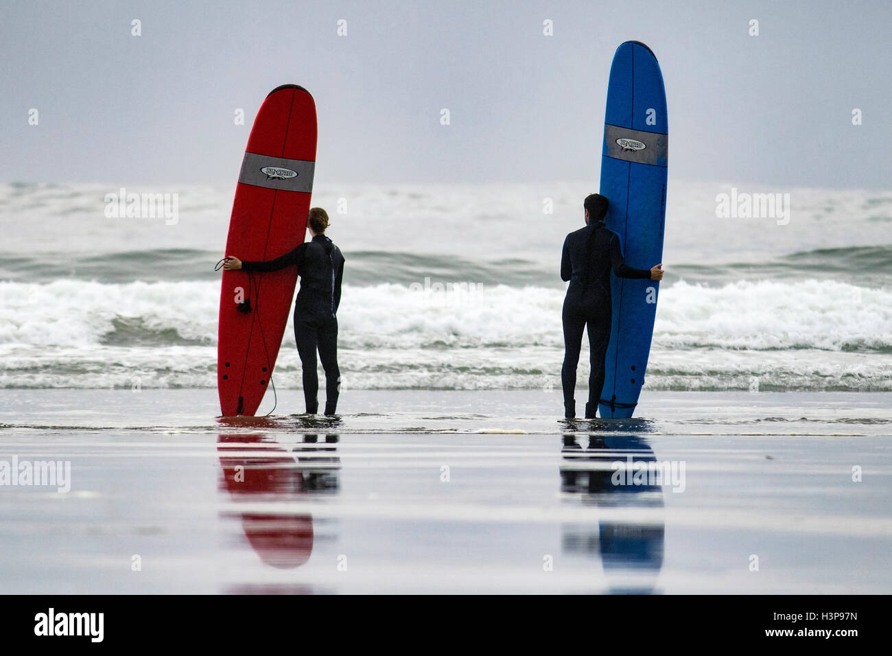 Surfers at Chesterman Beach - Tofino, Vancouver Island, British Columbia, Canada Stock Photo