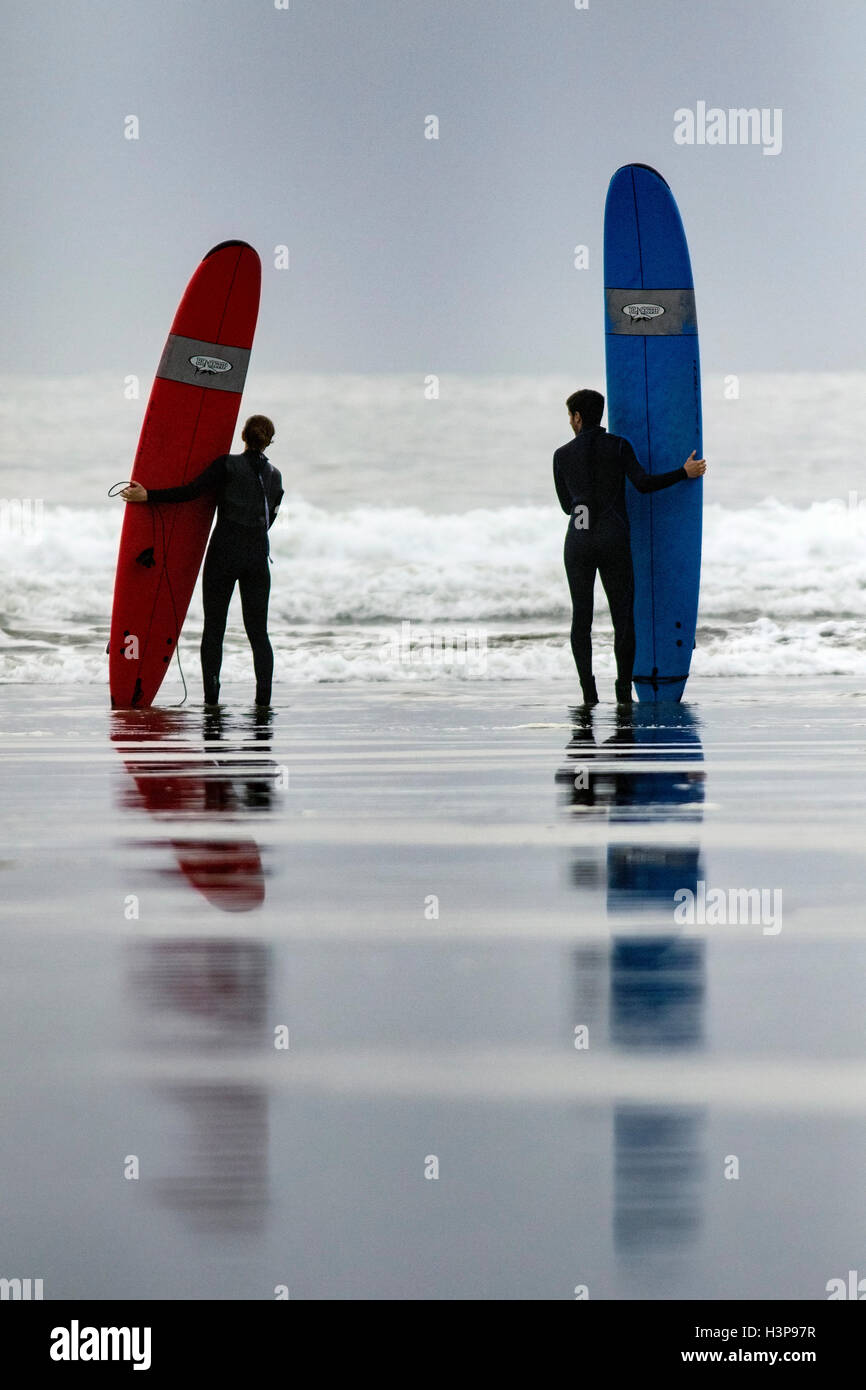 Surfers at Chesterman Beach - Tofino, Vancouver Island, British Columbia, Canada Stock Photo