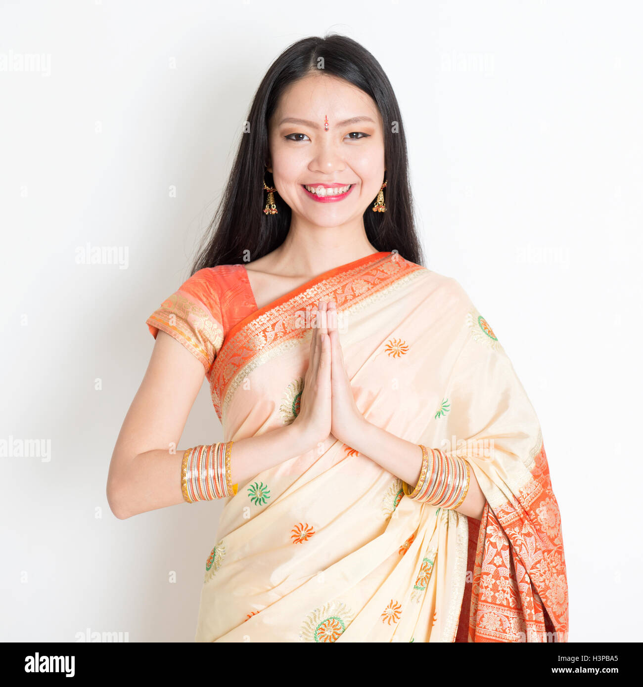 Portrait Of Mixed Race Indian Chinese Girl With Traditional Sari Dress
