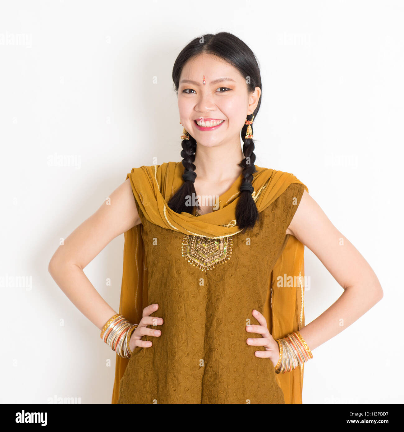 Portrait of beautiful mixed race Indian Chinese woman in traditional