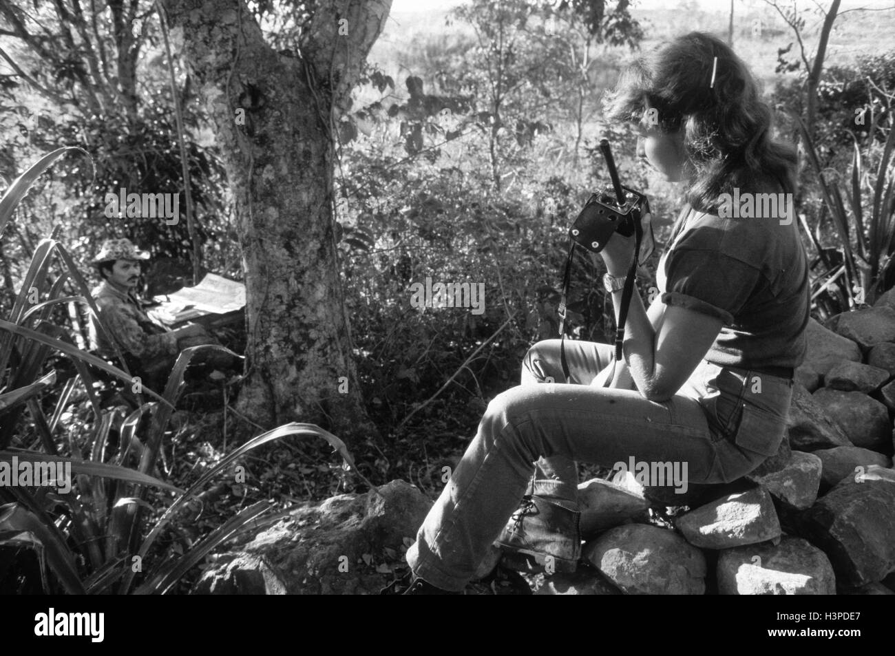 GUAZAPA, EL SALVADOR, FEB 1984: - Within the FPL Guerrilla's Zones of Control -  Women guerrilla radio operators keep contact between FPL combat units. Stock Photo