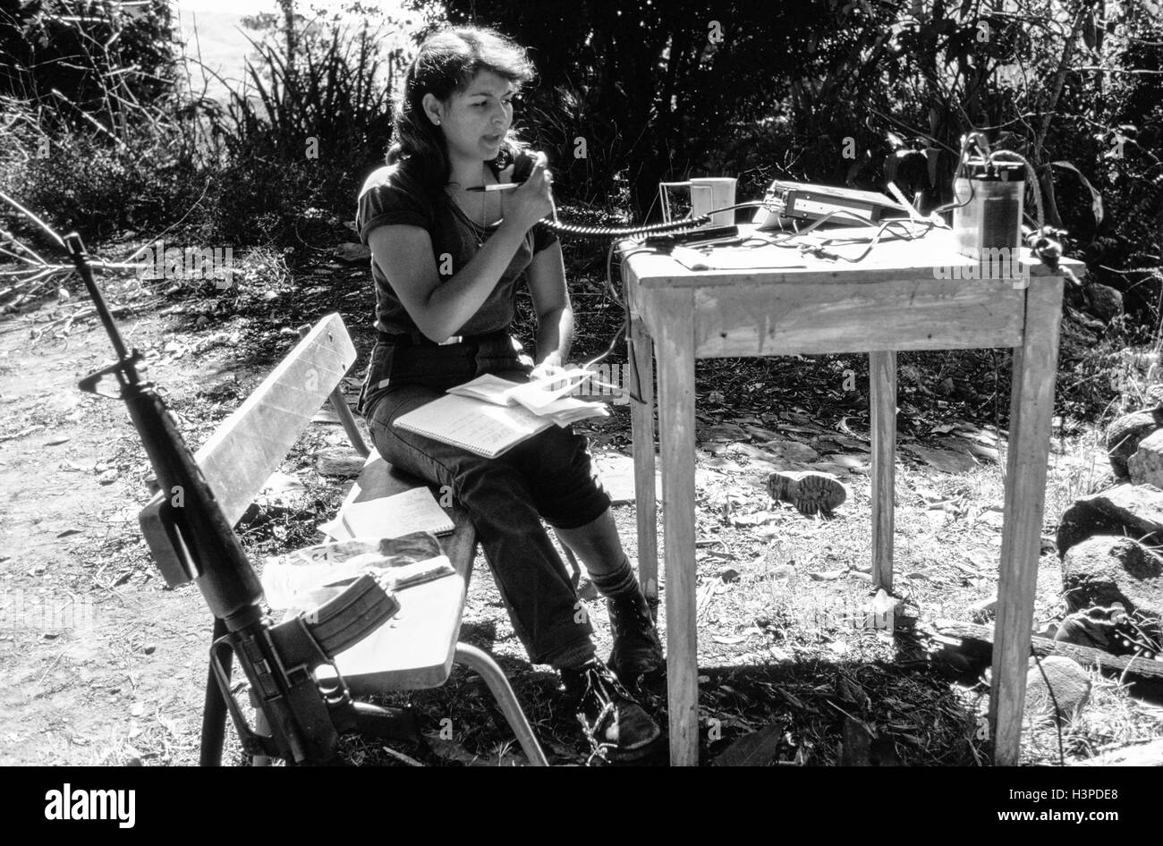 GUAZAPA, EL SALVADOR, FEB 1984: - Within the FPL Guerrilla's Zones of Control -  Women guerrilla radio operators keep contact between FPL combat units. Stock Photo