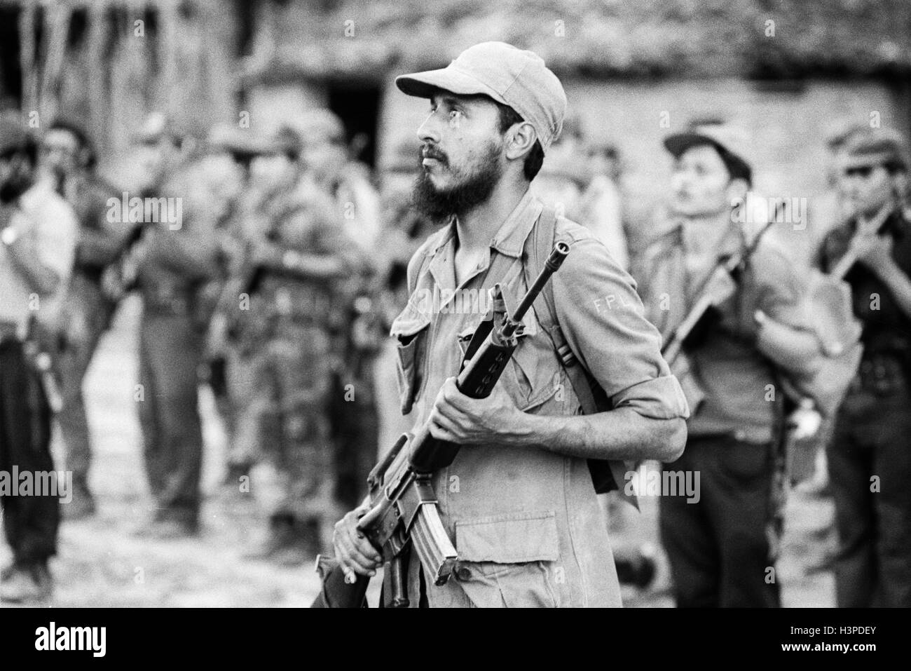 CHALATENANGO,  EL SALVADOR, FEB 1984: - Within the FPL Guerrilla's Zones of Control - Comandante Douglas speaks to some of the guerrillas that had been gathered for an offensive. Stock Photo