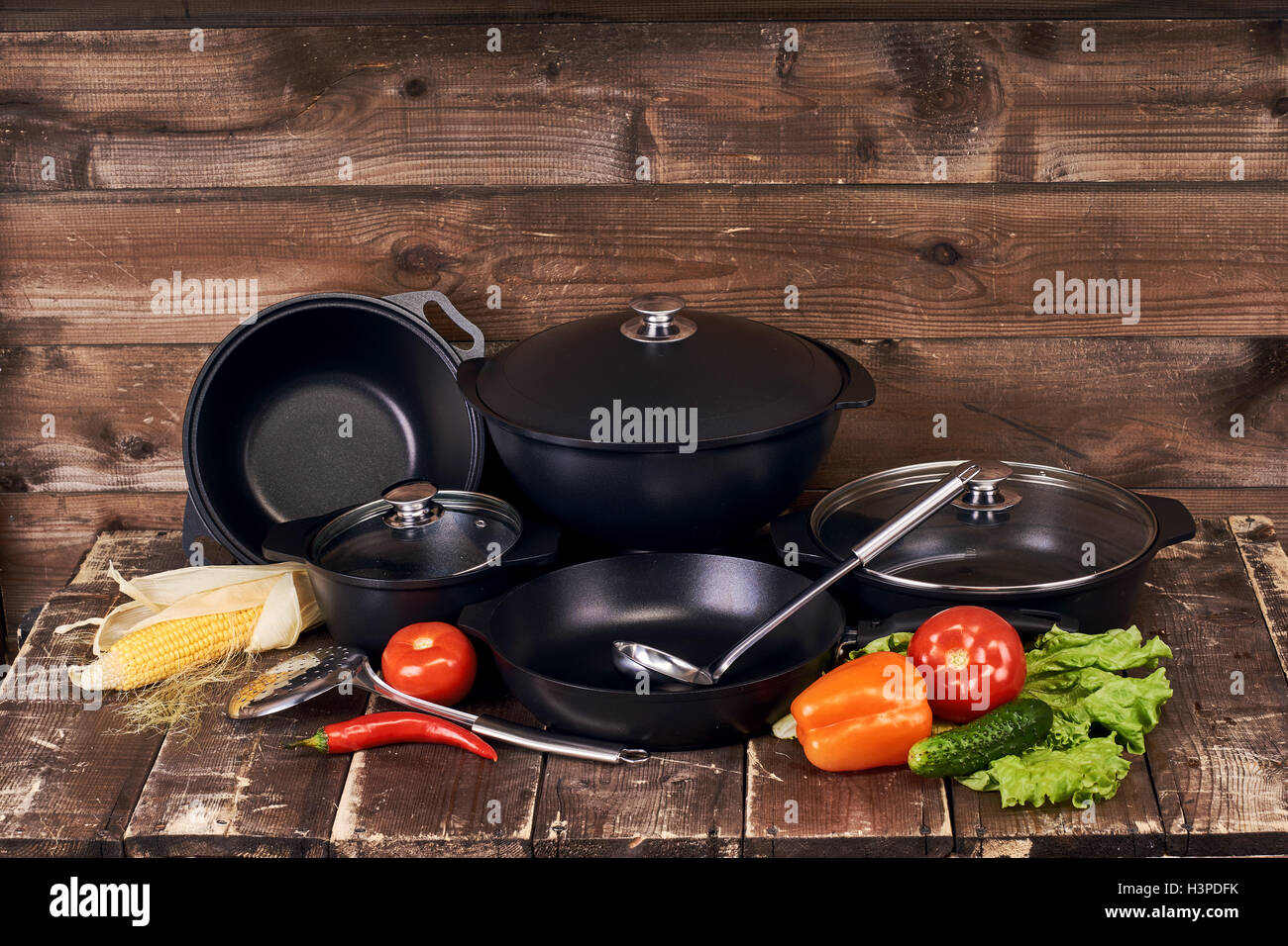 Collection of black pots Stock Photo Alamy