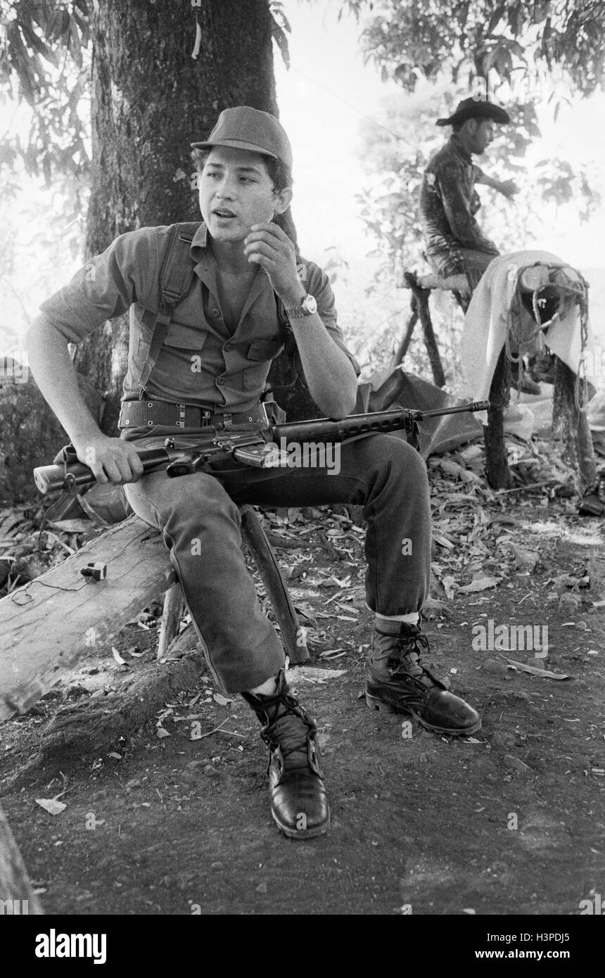 CHALATENANGO,   EL SALVADOR, FEB 1984: - Within the FPL Guerrilla's Zones of Control   An FPL fighter taking a break. Stock Photo