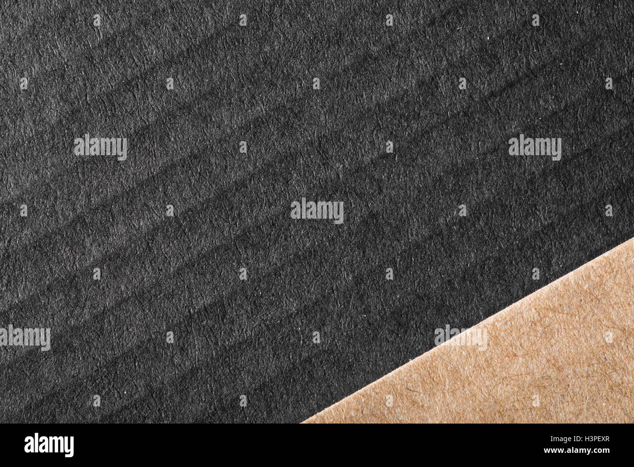 Horizontal image of black and brown cardboard sheets. Luxury background with two parts Stock Photo