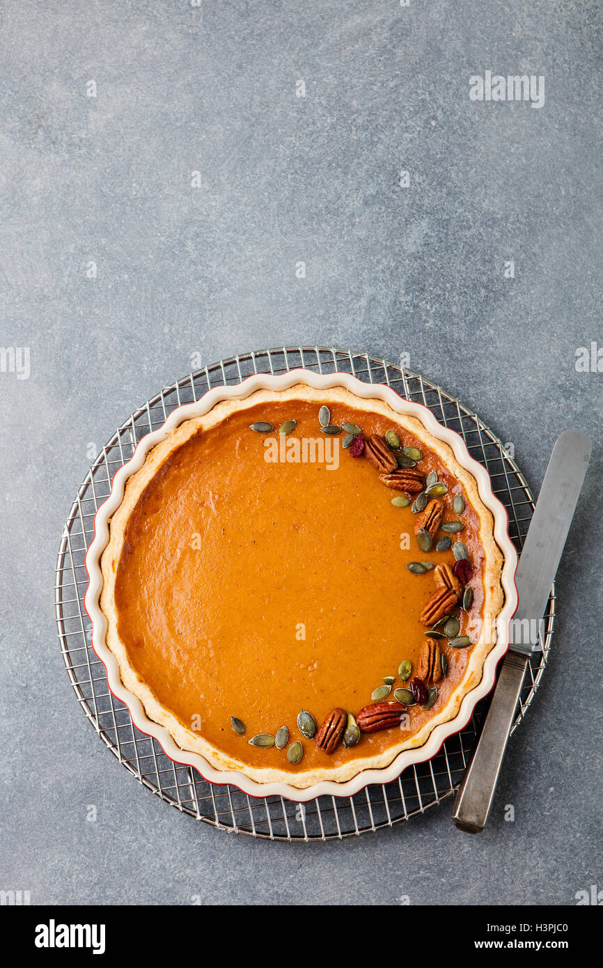 Pumpkin pie, tart in a baking dish. Top view Stock Photo Alamy