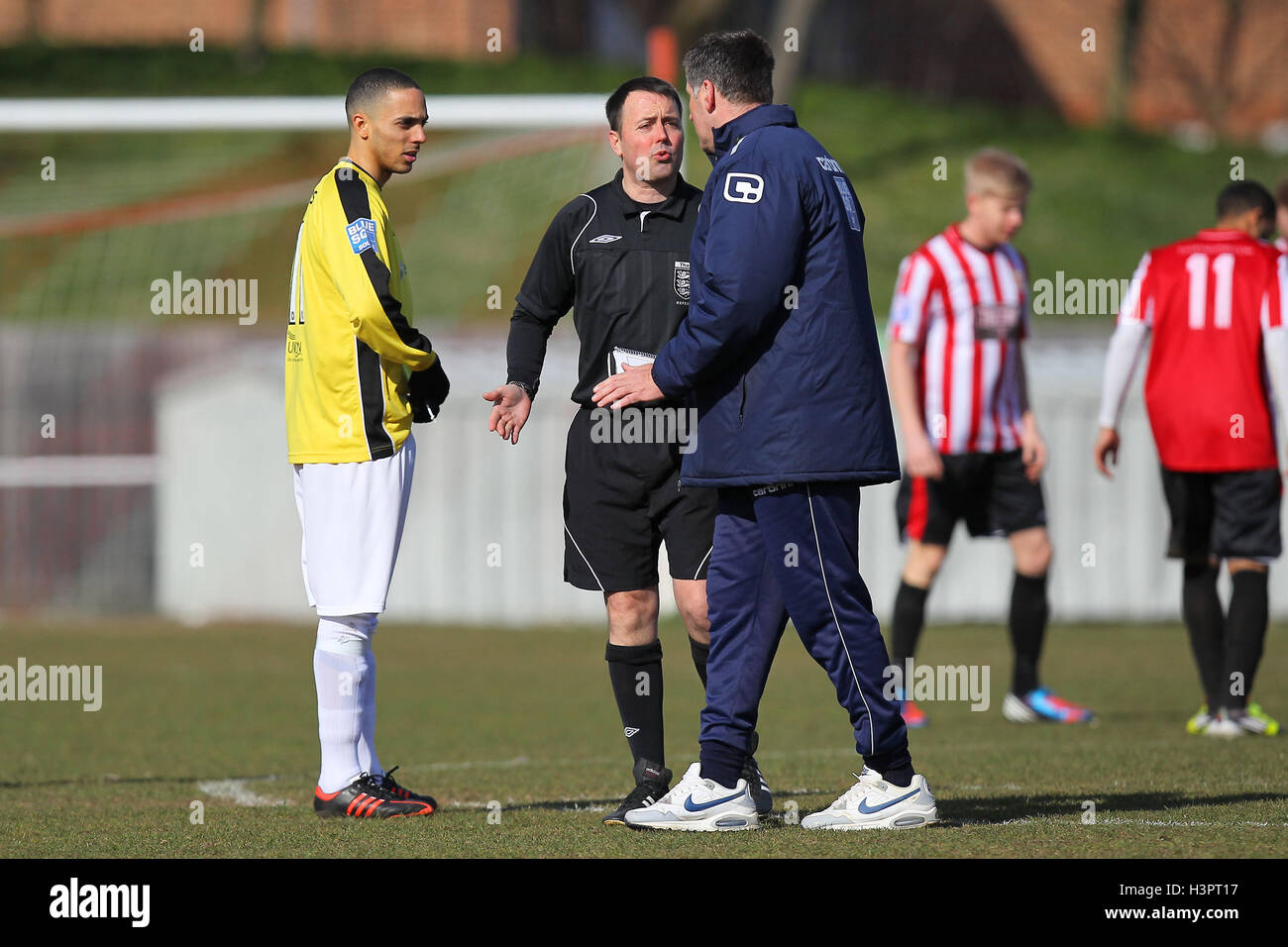 Hornchurch manager Jim McFarlane speaks to referee John Hopkins - AFC Hornchurch vs Bromley - Blue Square Conference South Football at The Stadium, Upminster Bridge, Essex - 01/04/13 Stock Photo