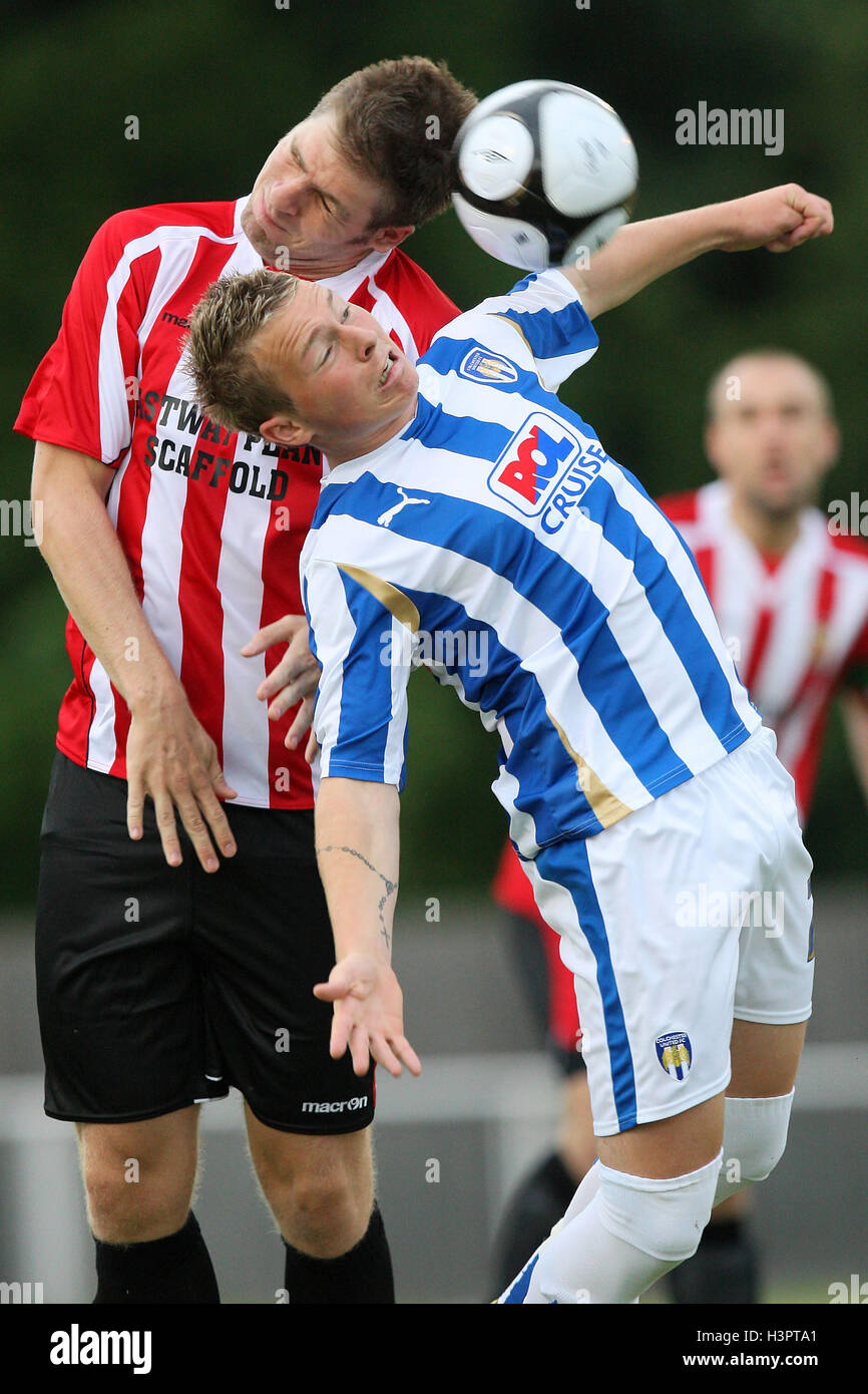 Ronnie Fletcher of Hornchurch beats Michael Rafter in the air AFC