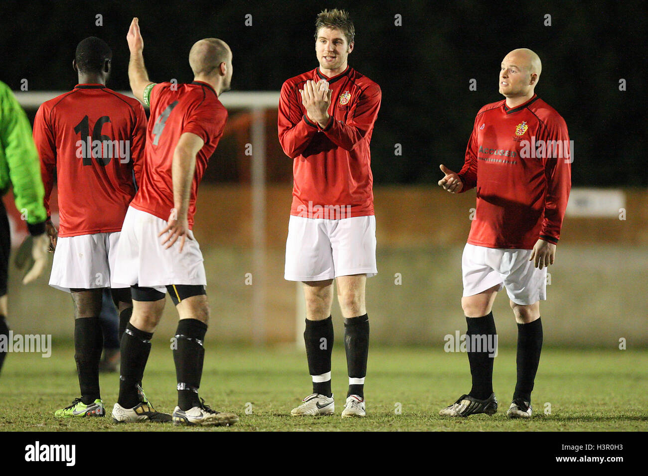 Ronnie Fletcher and Dave Collis (R) conduct a postmortem with Elliot