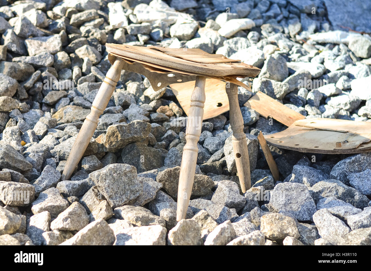 old and broken abandonend chair at a stone quarry, norway Stock Photo