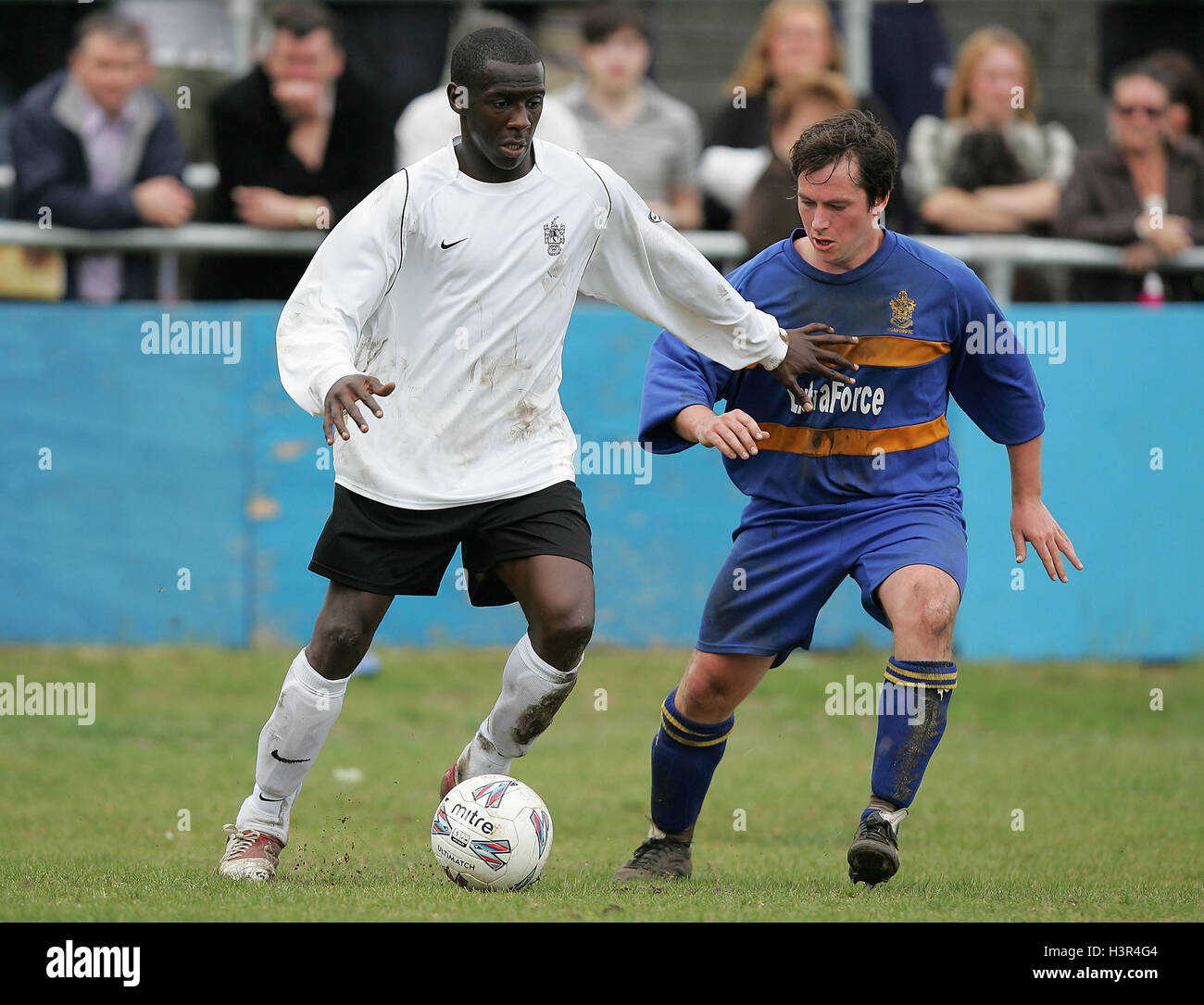 Michael Begg of Brentwood Town FC (L) in action against Romford's Ricki Mackin - 07/05/07. Stock Photo