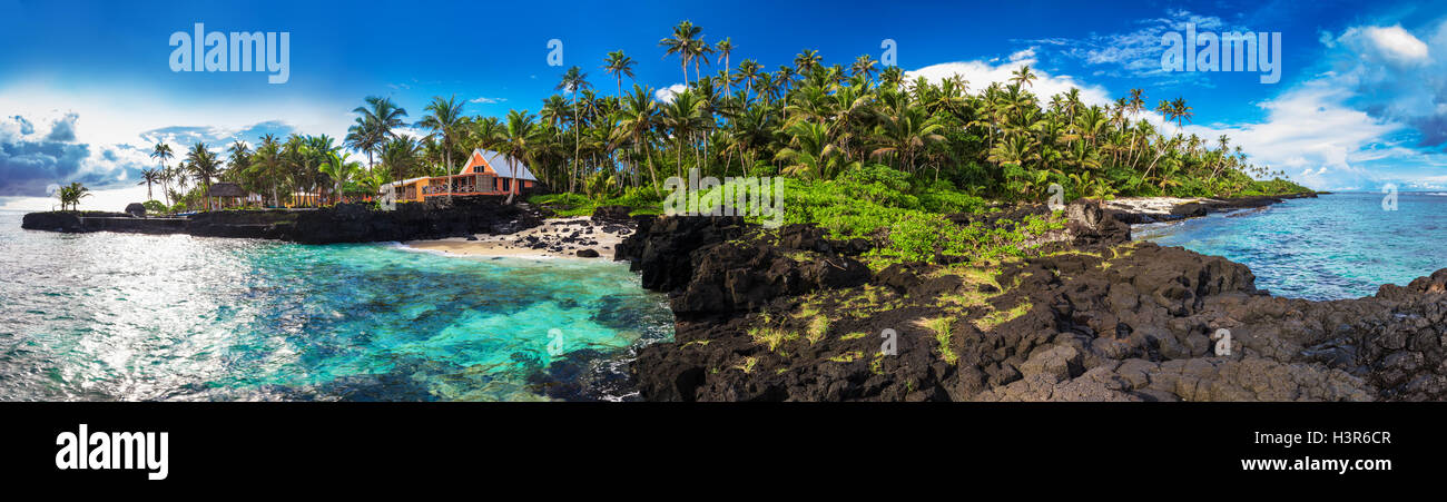 Panoramic view of coral reef and palm trees on south side of Upolu ...