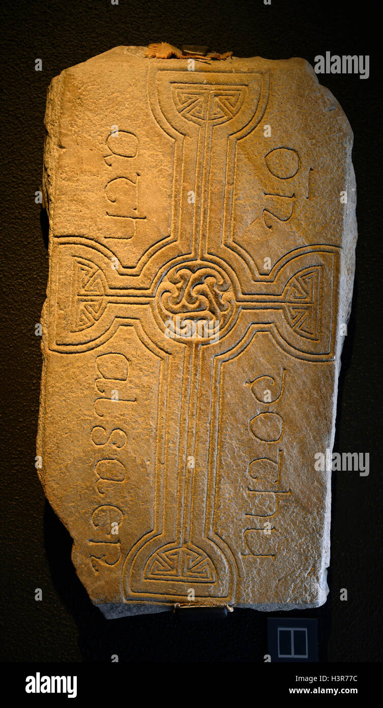Carved stone Tombstone monument display exhibit exhibition Museum Clonmacnoise Monastery Offaly RM Ireland Stock Photo