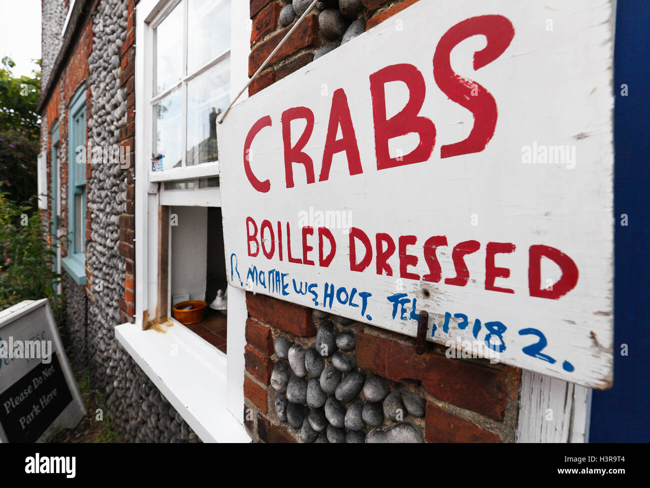 Crabs for sale from a house window in Holt, Norfolk, England, UK Stock