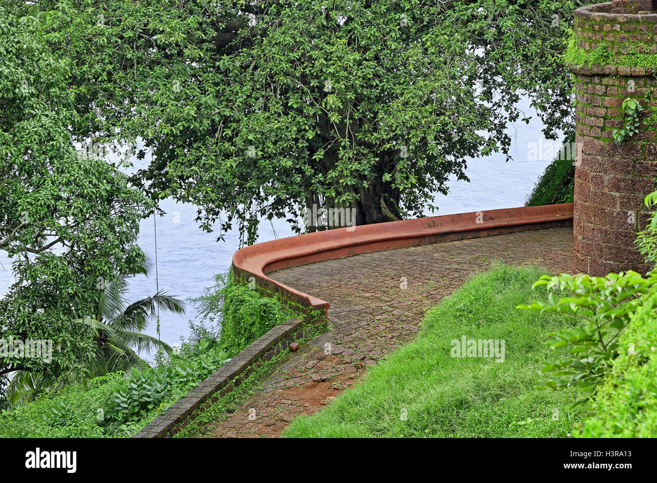 Stone paved entrance path to Portuguese era Reis Magos Fort in Goa, India Stock Photo