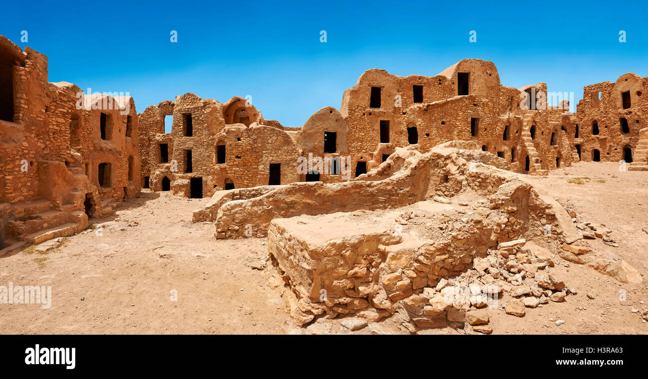 The traditional north Sahara fortified Berber Ksar El Mguebl and its adobe mud ghorfas graneries, near Tataouine, Tunisia Stock Photo