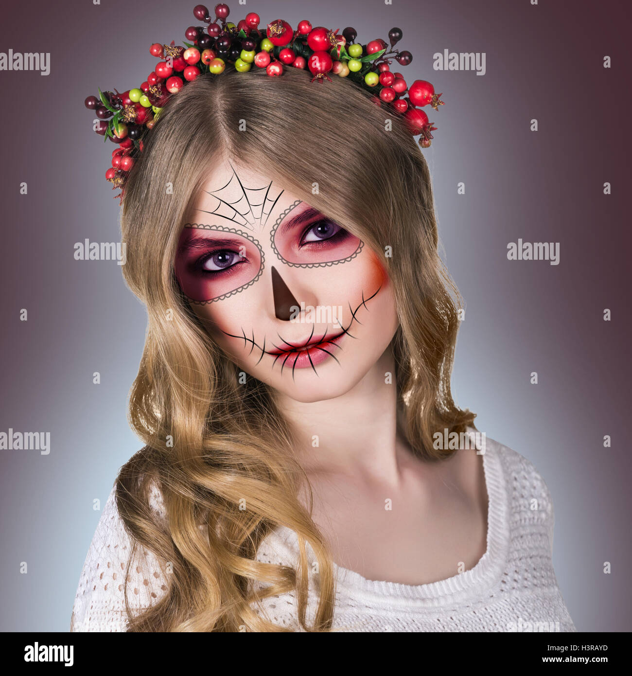 Woman in day of the dead mask Stock Photo