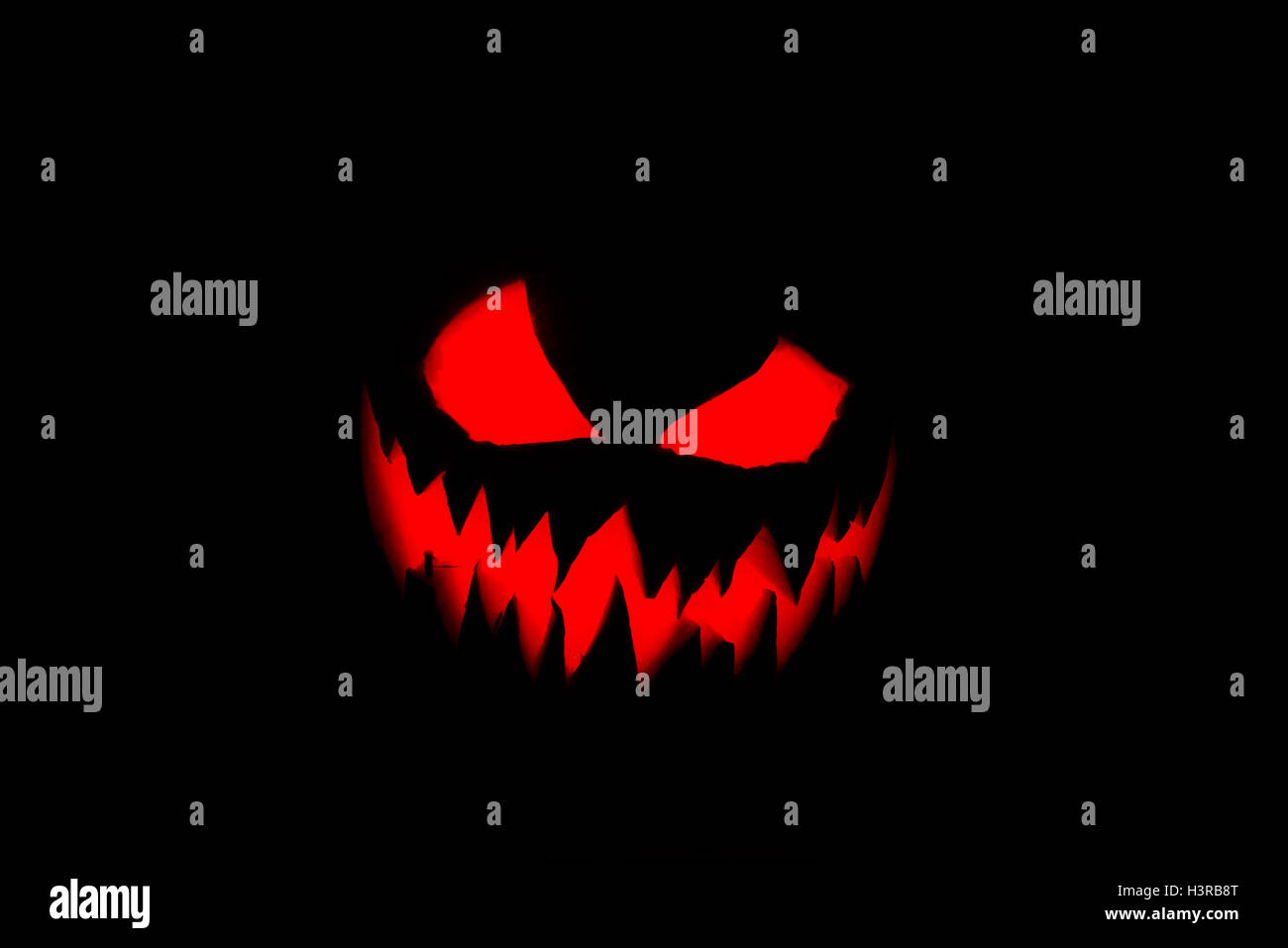 Halloween pumpkin's grin on black isolated background Stock Photo