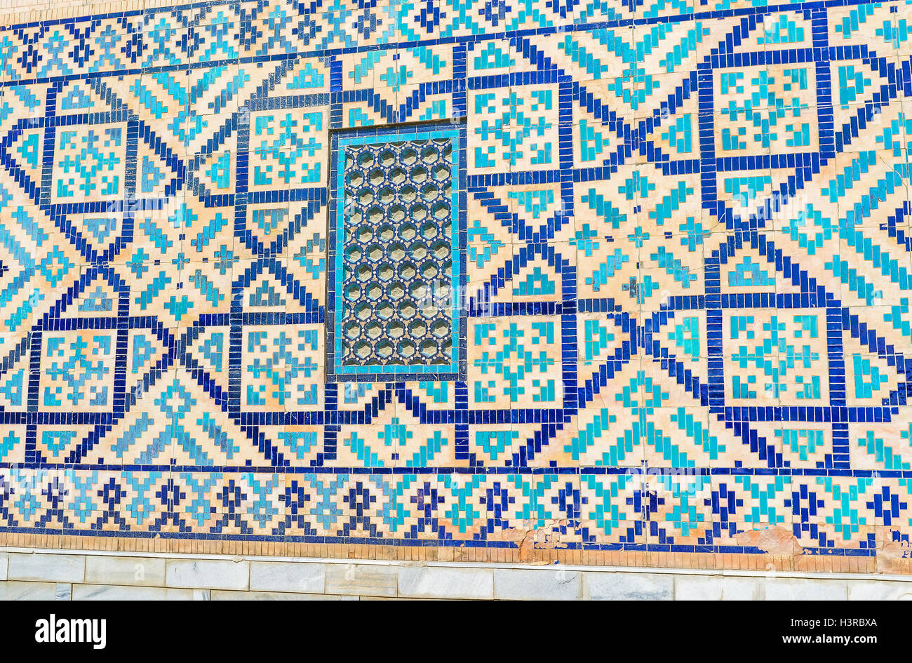 The brick back wall of Tilya Kori Madrasah with the element of the ...