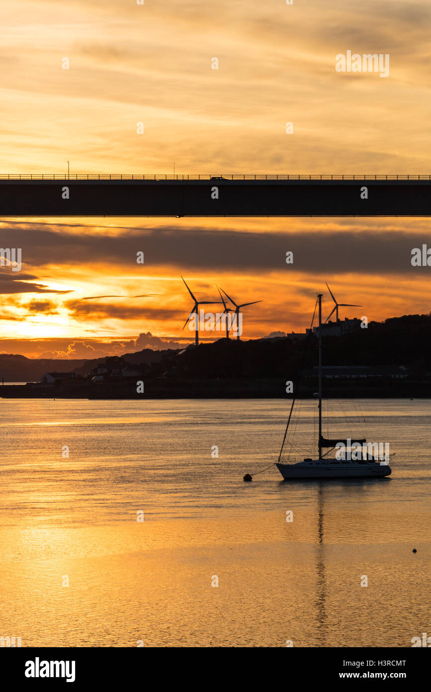 Cleddau Bridge, Milford Haven, Pembrokeshire, UK at sunset from Burton Stock Photo