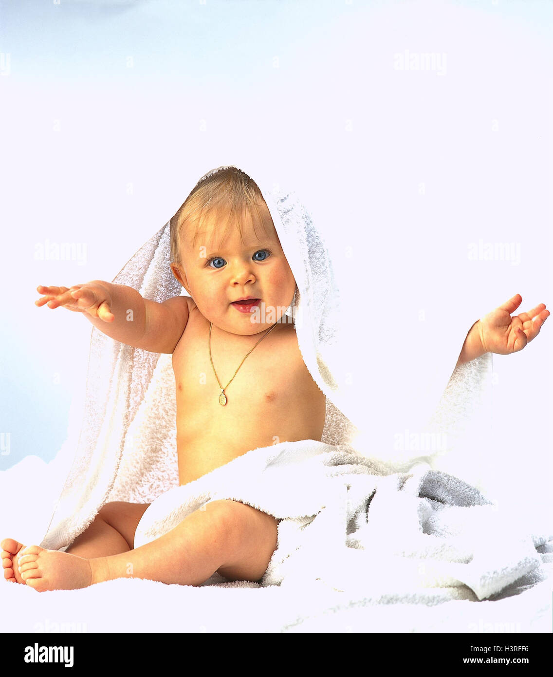 Infant, towel, gesture, child, baby, necklace, towelling towel, towels, sit, stretch hands, melted, learning process, development phase, carefully, attention, expression, happy, joy Stock Photo