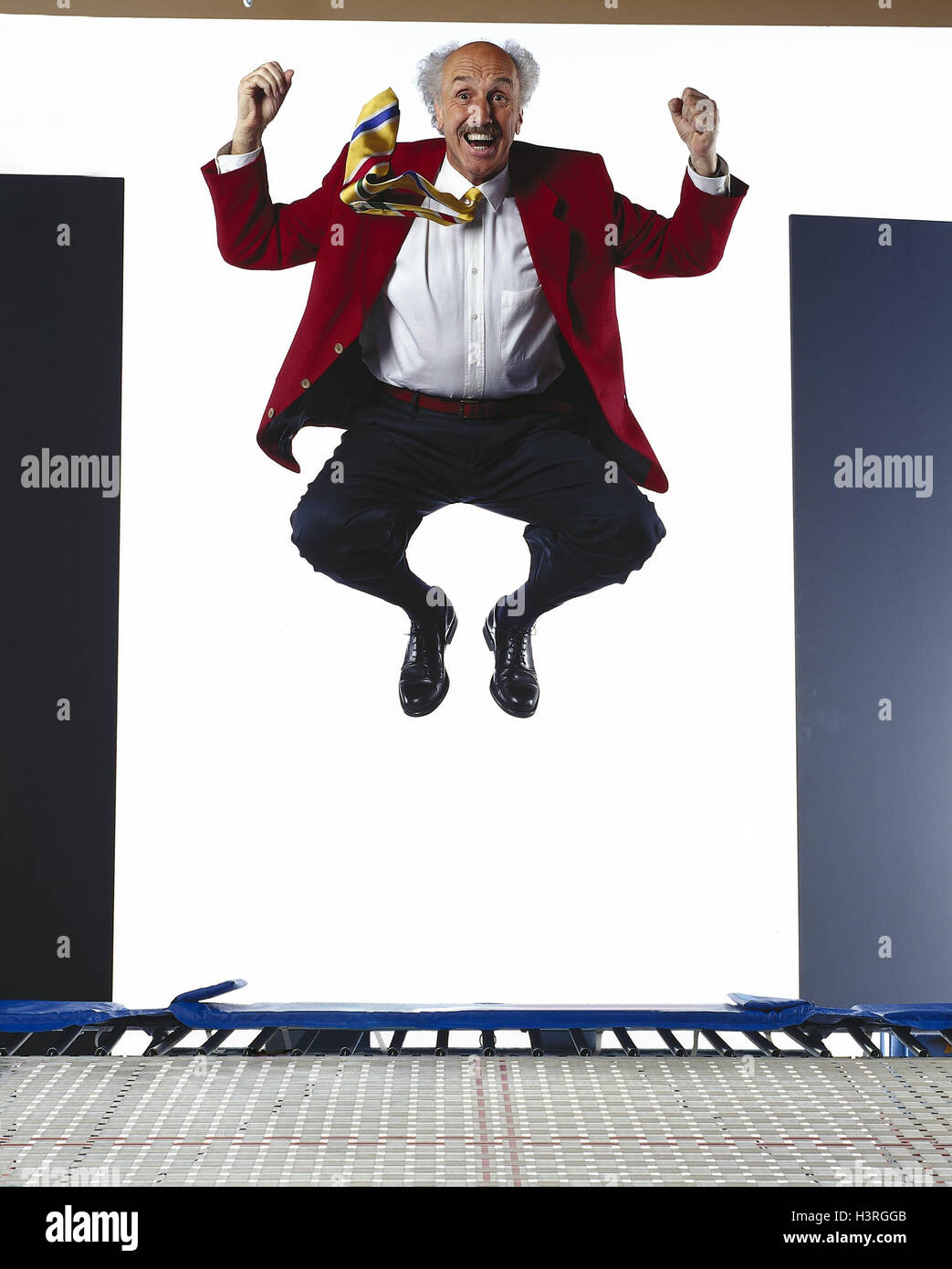 Senior, suit, cheering, caper man, old, forehead bald head, crack, jump, joy, pleases, enthusiasm, enthusiastically, fit, sportily, happy, body control, whole body, inside, studio, cut out Stock Photo