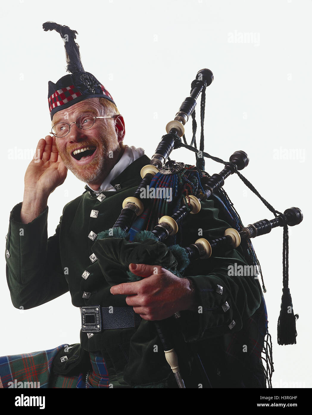 Scot, bagpipes players, gesture, - 'hear', studio piper, bagpipes, pouch whistle, Bagpipe, wind instrument Stock Photo