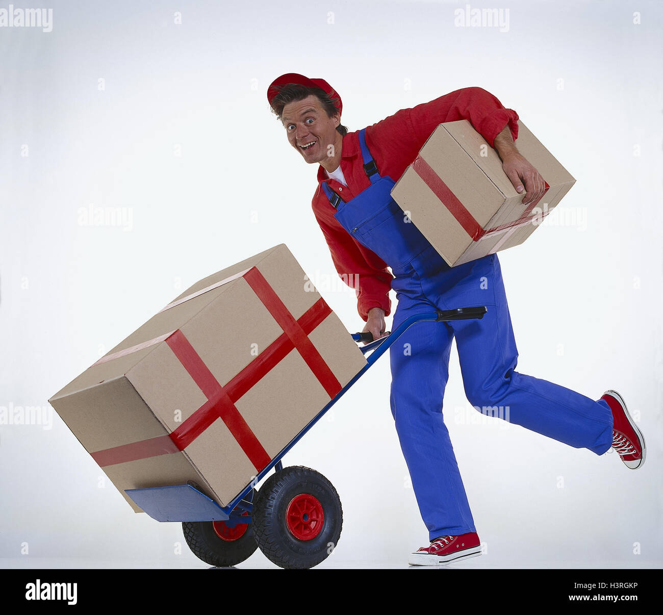Man, working clothes, packages, delivery, haste, studio warehouseman