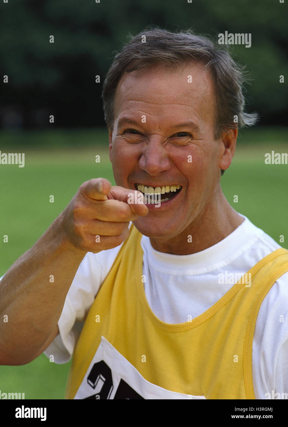 Man, sports clothes, laughing, gesture, portrait, mb 240 A6 Stock Photo