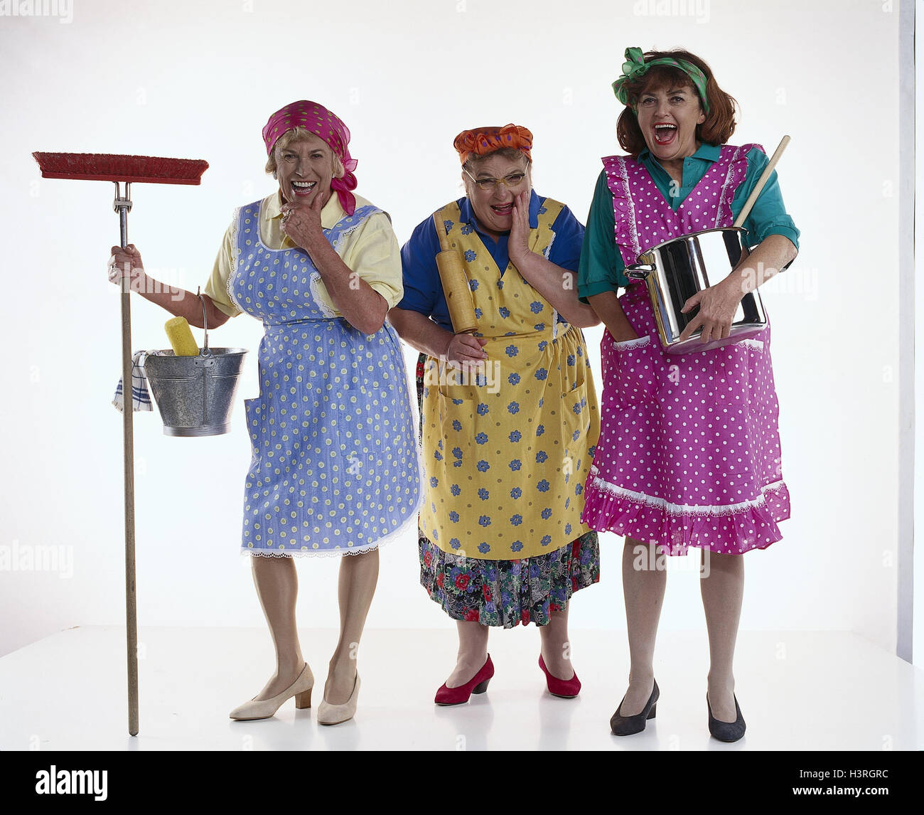 three housewives, brooms, cleaning buckets, rollingpin, saucepan