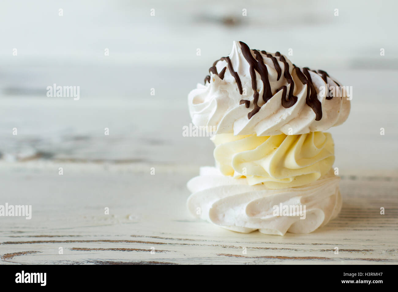 Meringue with yellow cream Stock Photo Alamy