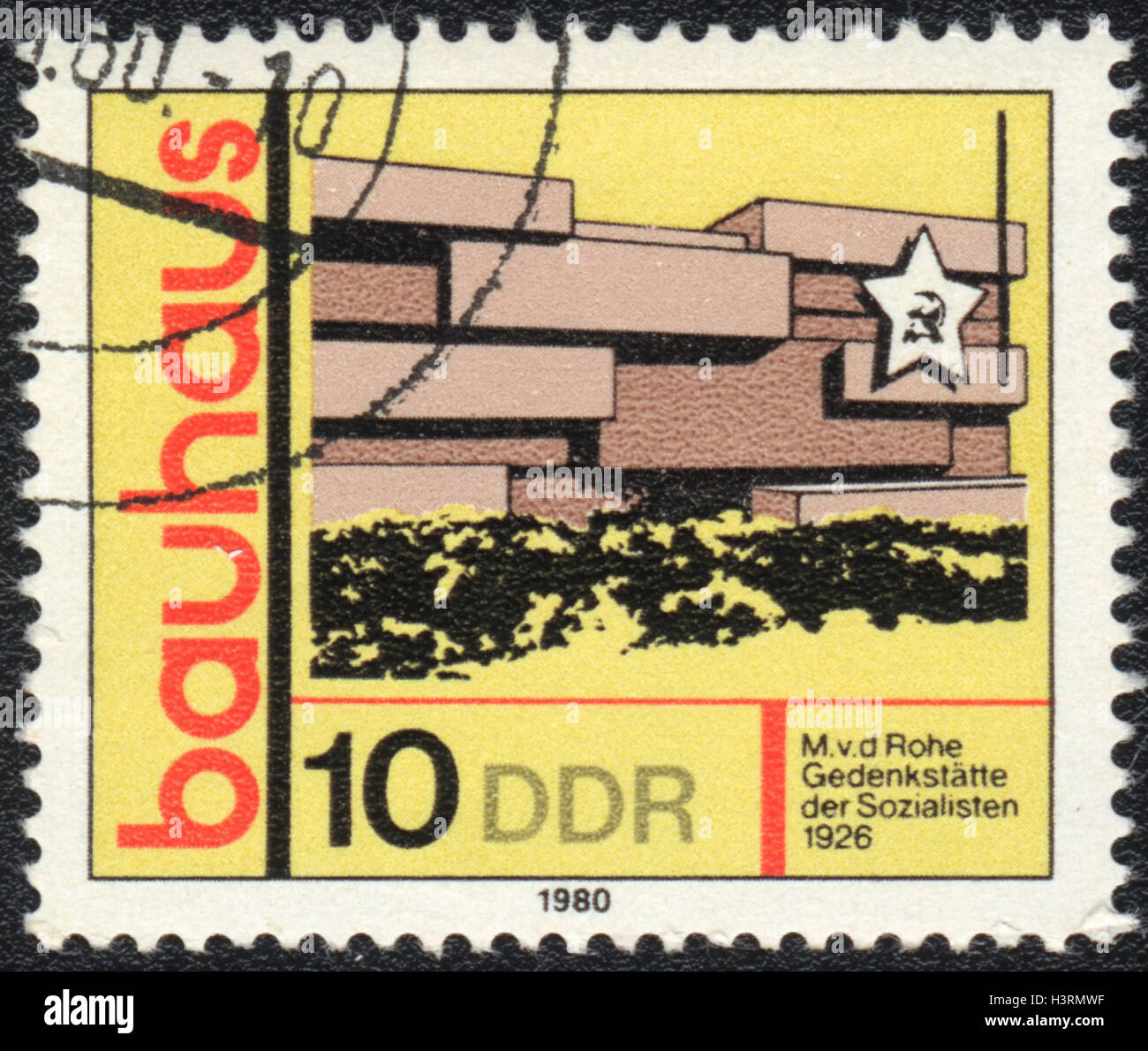 A postage stamp printed in DDR Germany,  shows Memorial of Socialists, Bauhaus school, 1980 Stock Photo
