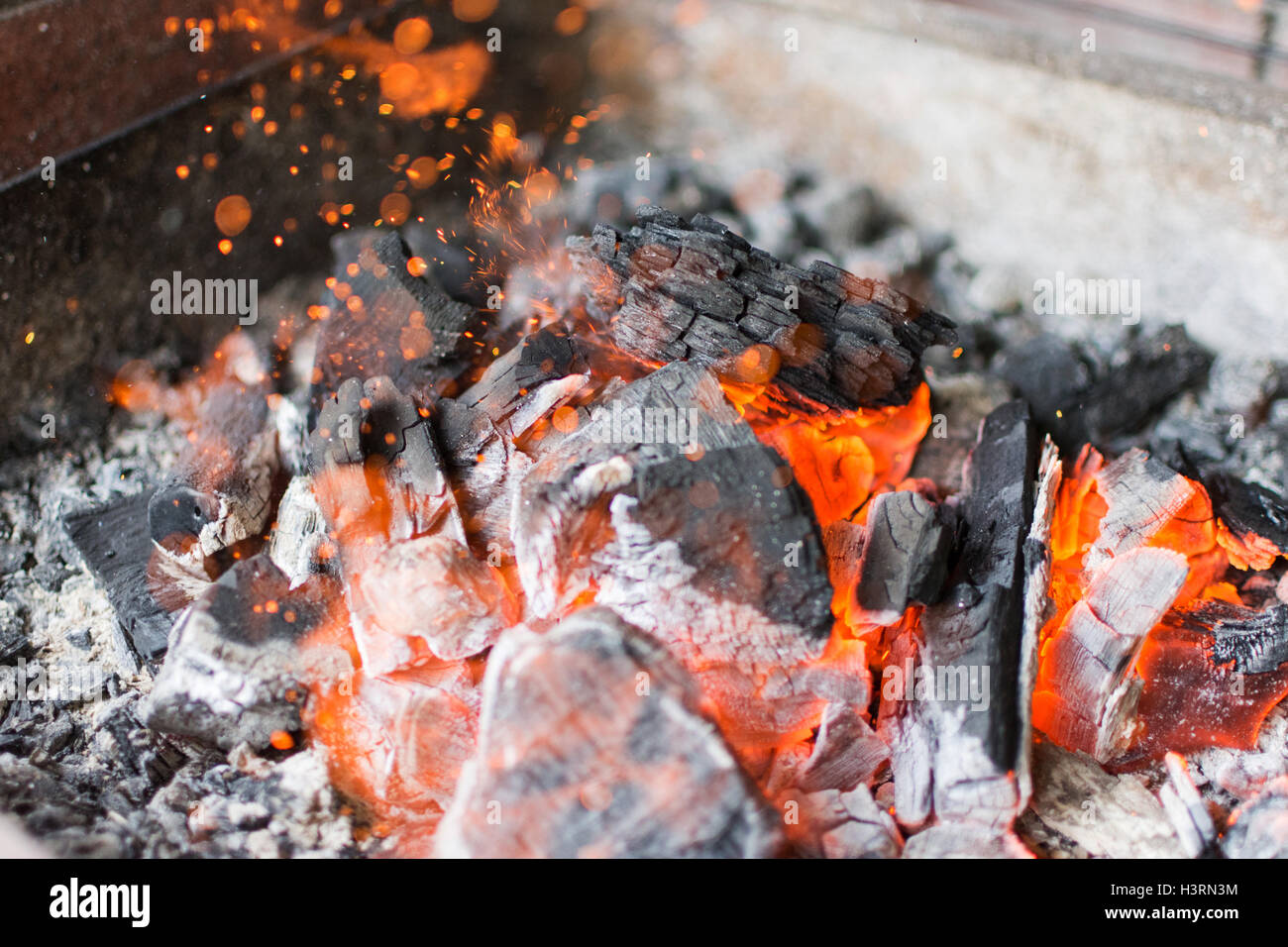 Hot Charcoal Glowing Briquettes. Burning Charcoal Close Up Stock Photo