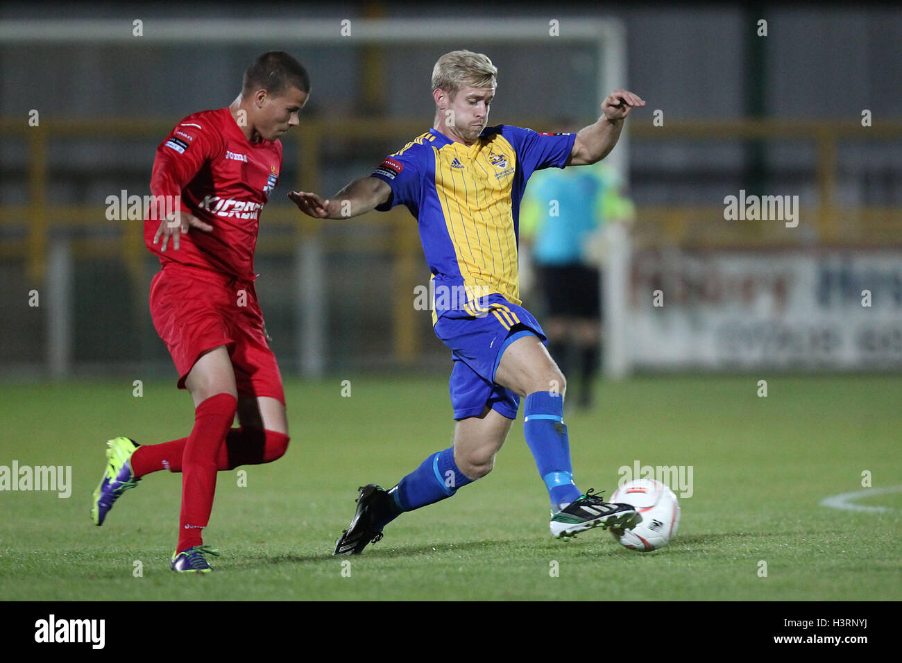 Paul Preston of Romford evades Shane Wallace of Redbridge - Romford vs Redbridge - Ryman League Divison One North Football at Ship Lane, Thurrock FC, Purfleet, Essex - 10/09/14 Stock Photo