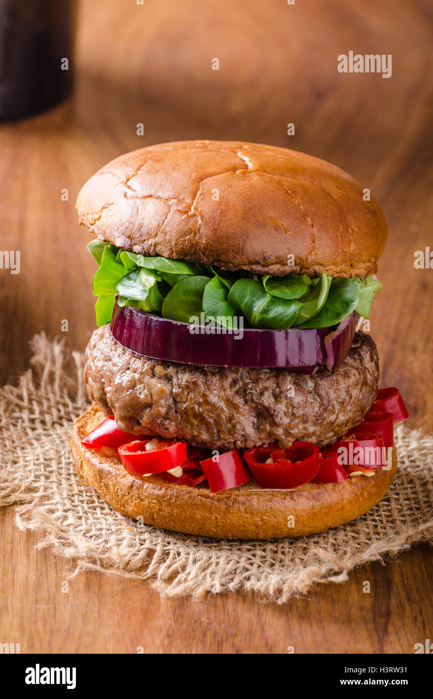 Delicious beef burger with egg and chilli Stock Photo Alamy